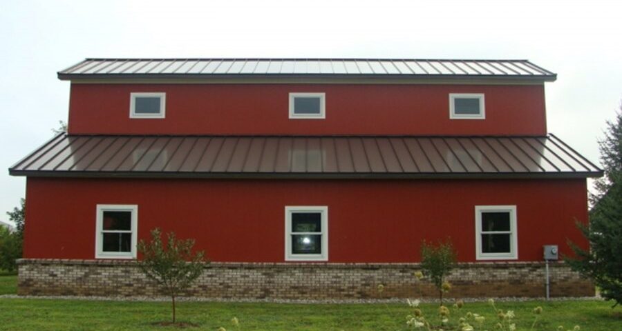 Modern galvanized steel barndominiums in Safford, Arizona showcasing sustainability and rustic charm