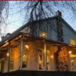 Stunning galvanized steel barndominiums in Sun Lakes, Arizona showcasing modern design and rustic charm