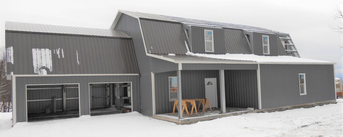 Exterior view of galvanized steel barndominiums in Thatcher, Arizona showcasing modern design and rural charm