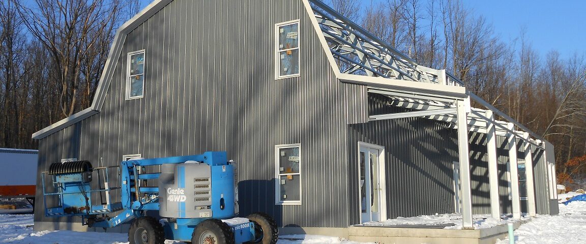 Image of galvanized steel barndominiums in Tucson Estates, Arizona, showcasing modern durability and rural charm