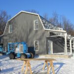 Image of galvanized steel barndominiums in Tucson Estates, Arizona, showcasing modern durability and rural charm