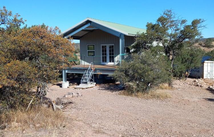 Modern galvanized steel cabins in Eloy, Arizona, showcasing durable construction and innovative design for comfortable living